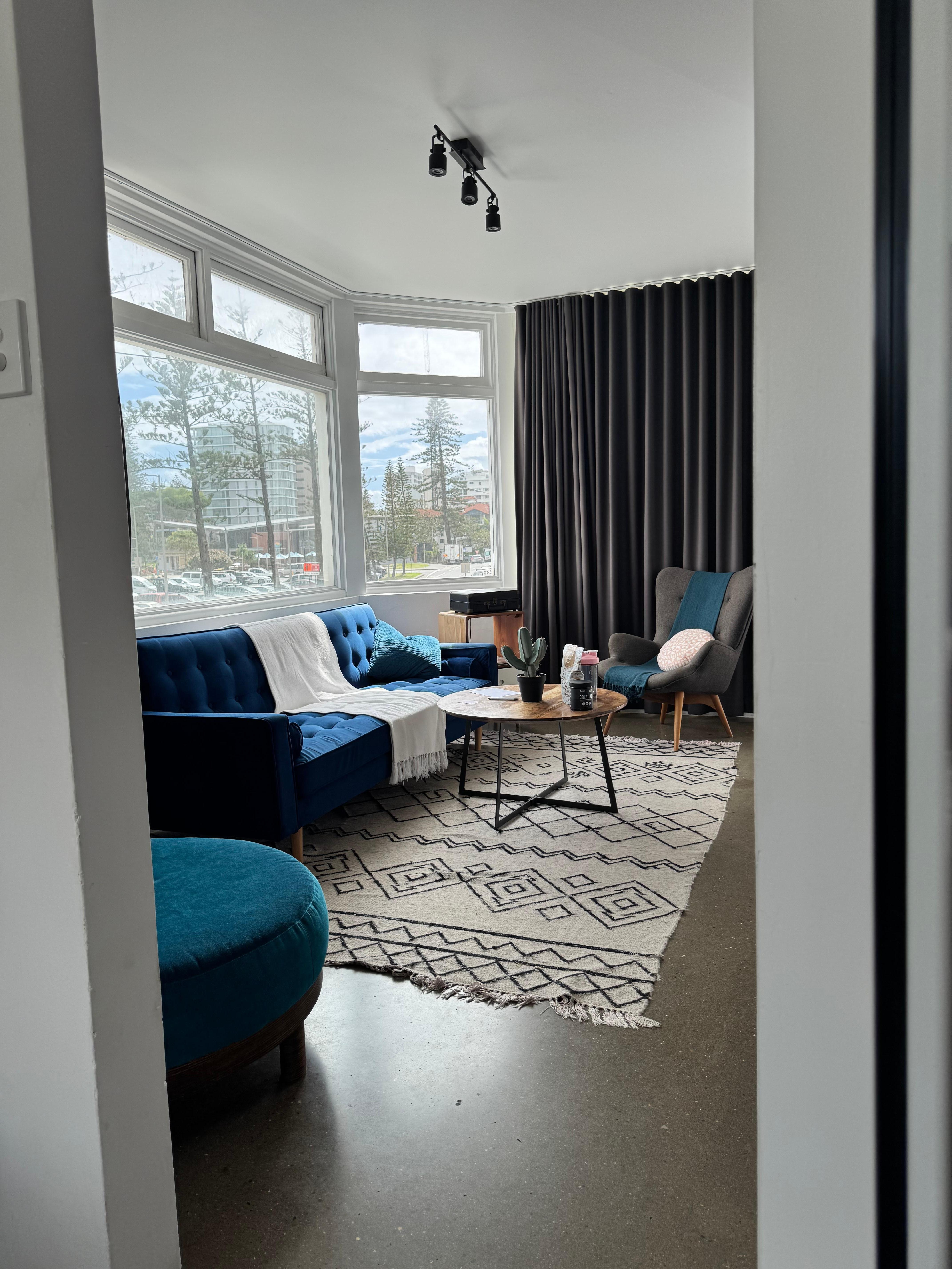 Massive windows in the lounge room- views of greenmount beach. Also a record player in the corner was a fun touch ! Plenty of records to choose from too!