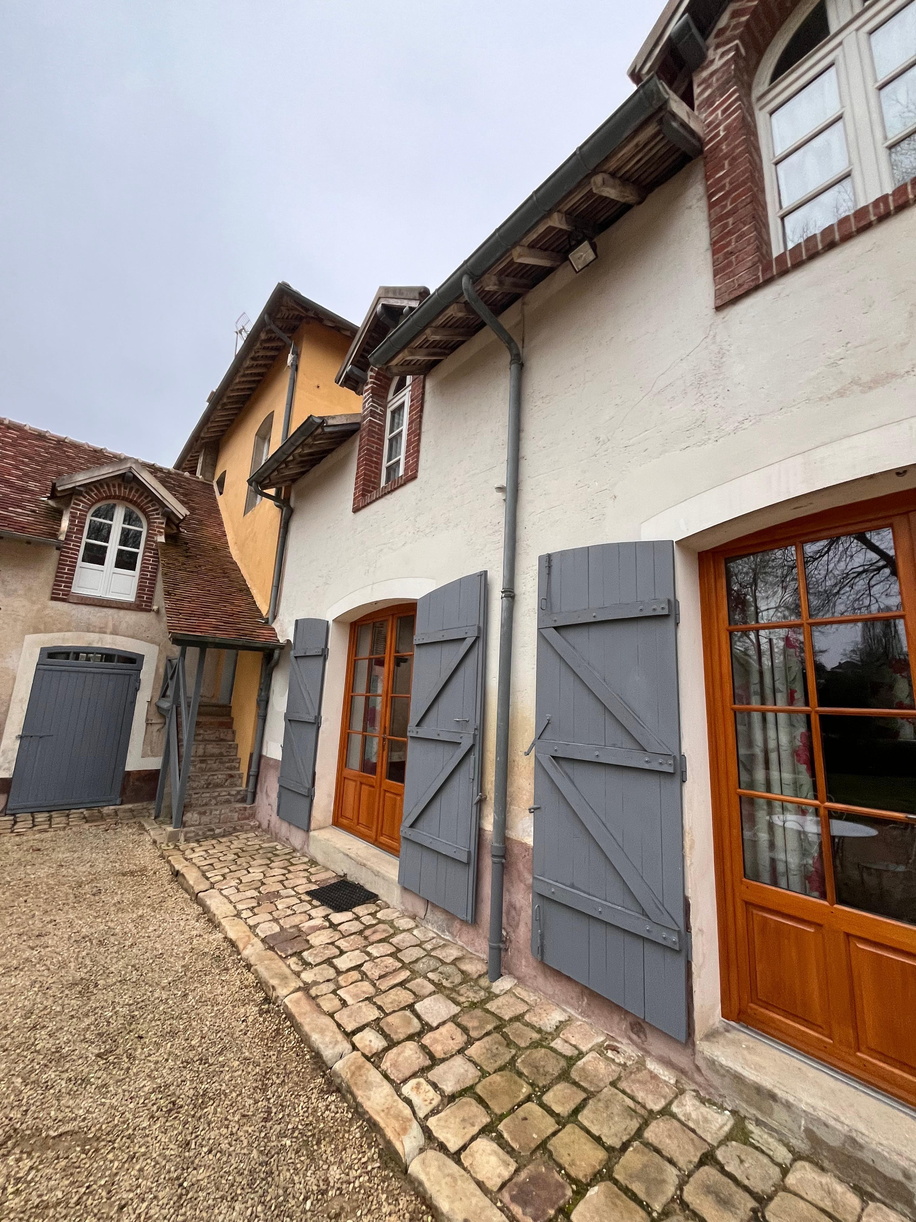 The view walking into the courtyard up to the front door of our rental. Very cute!