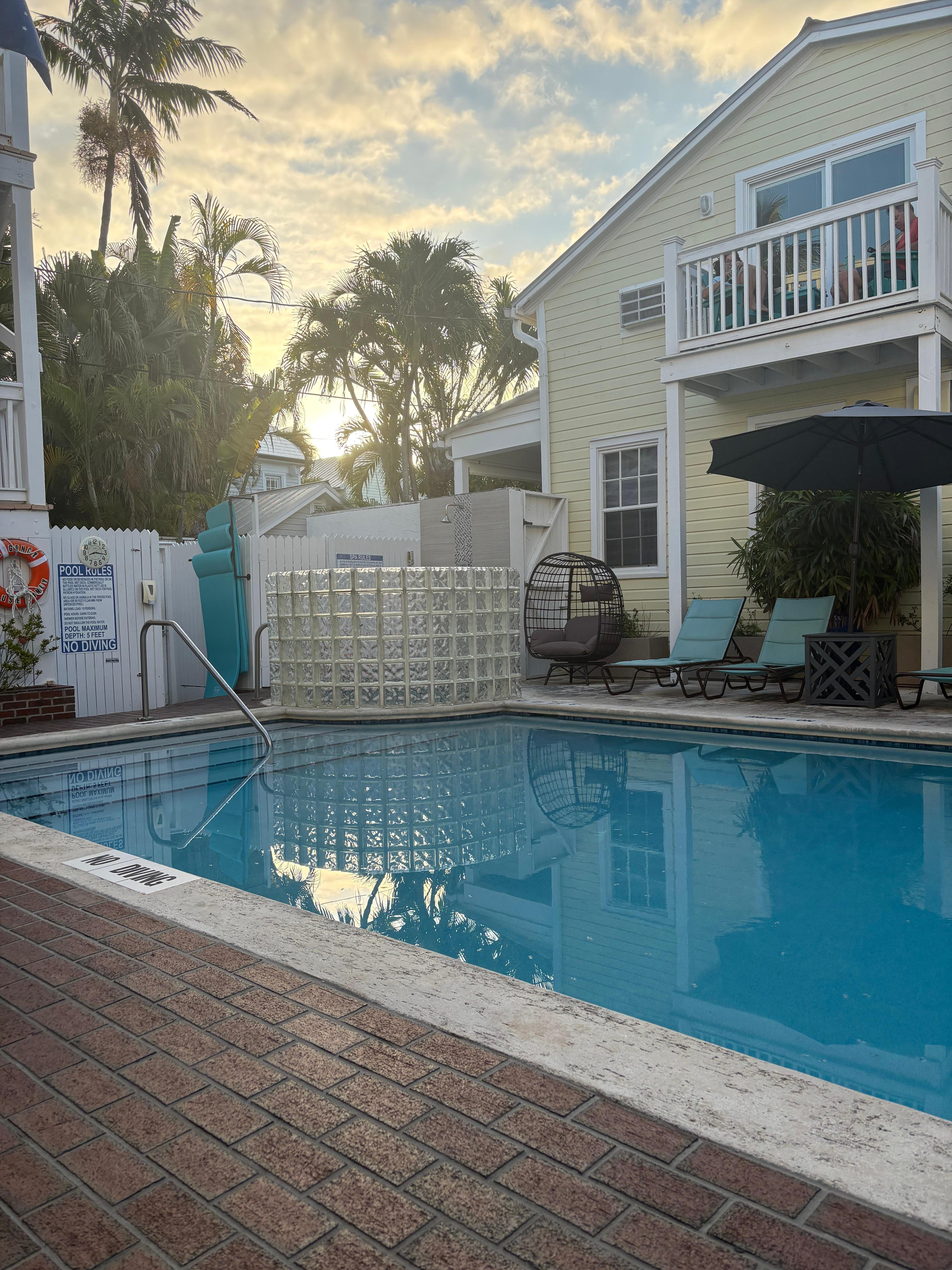 Behind the block glass is a hot tub