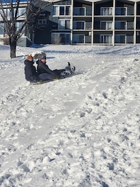 Toboganning hill beside chalets