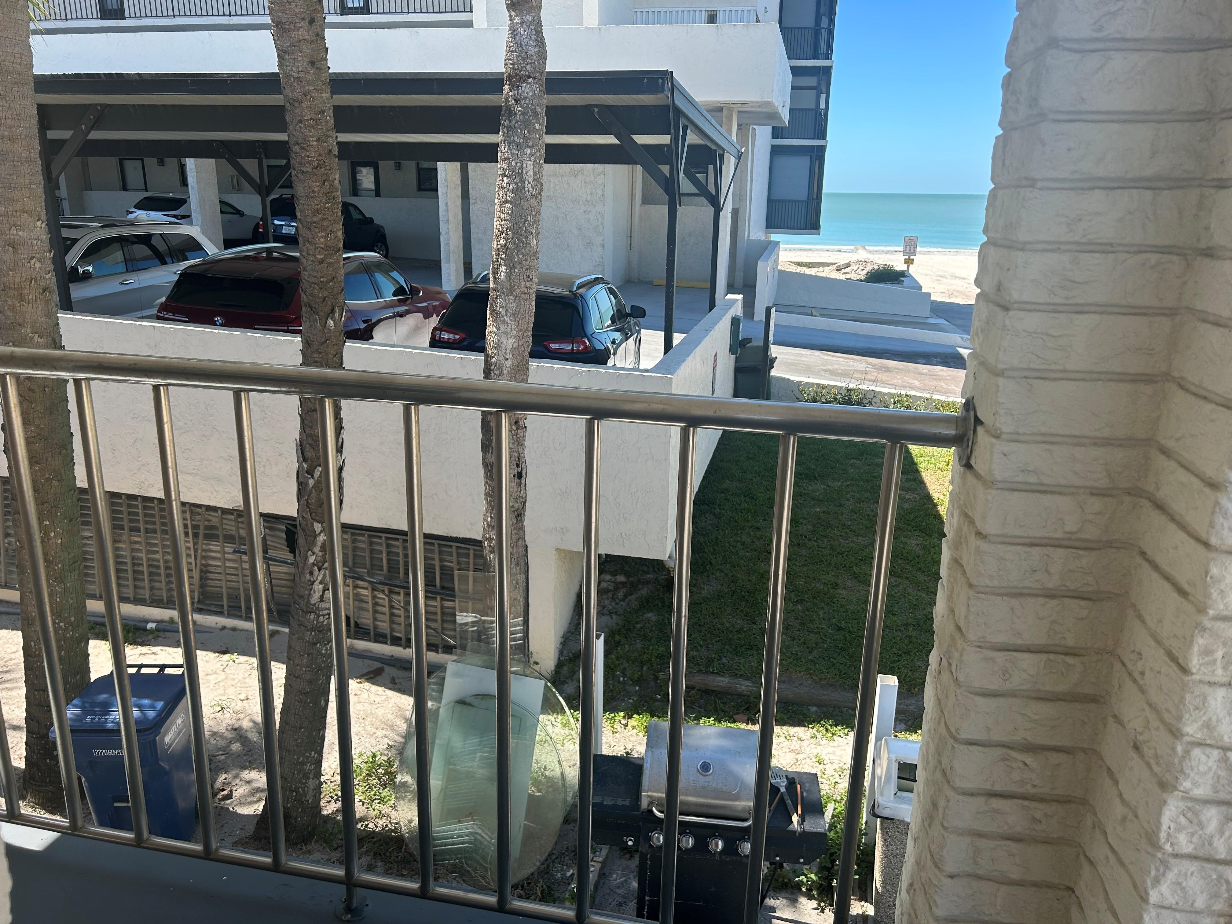 Crane your neck and look across the trash cans past the high rise building that really IS beachfront and you can see part of a beach. And this is advertised as a "Beachfront Penthouse"