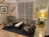 Other side of the dining room. Sitting area with music station.