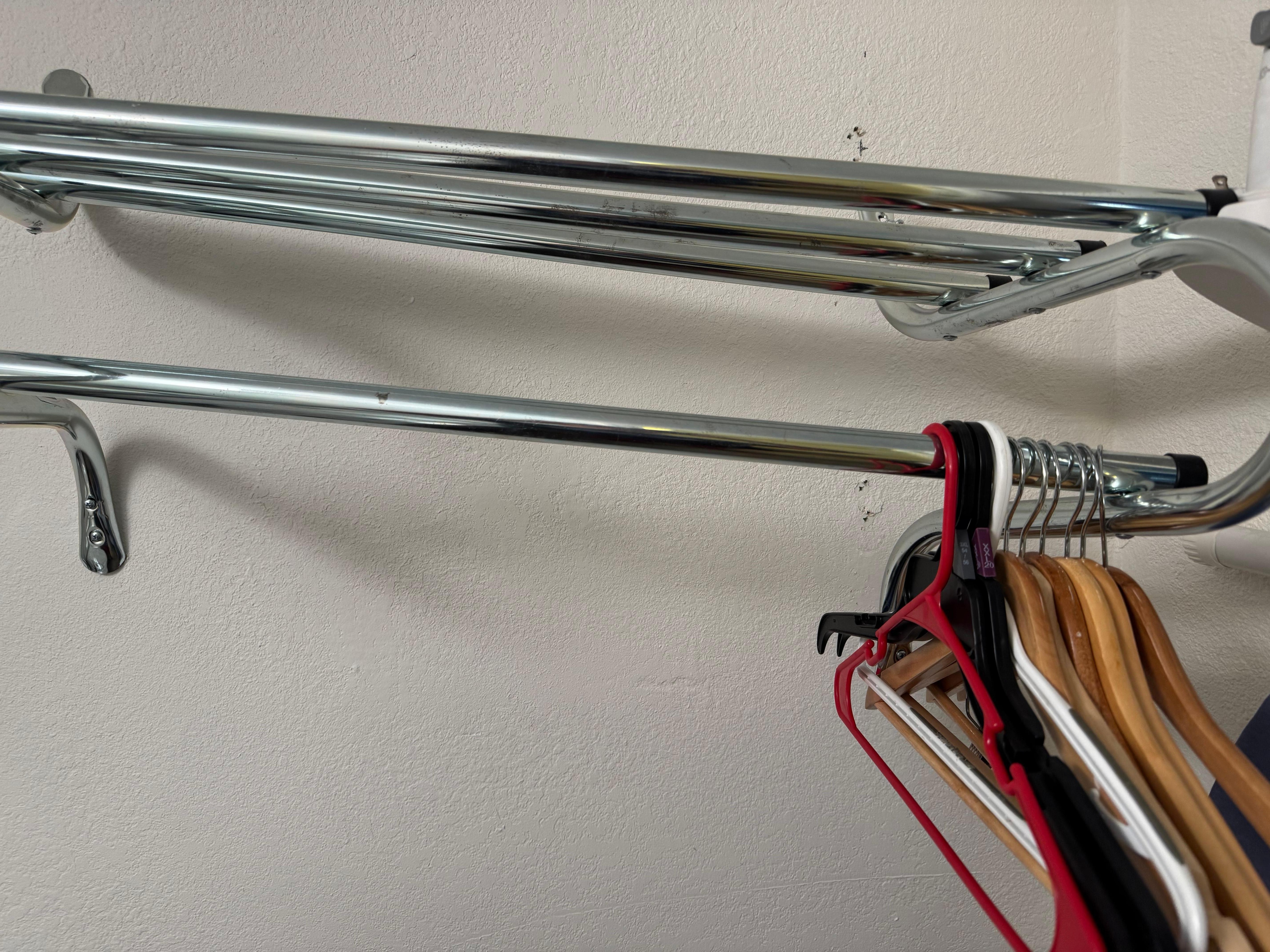 Rack broken and hanging off the wall