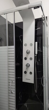 The semi-functional shower, only the water from the top worked.