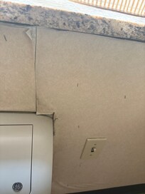 Wallpaper stapled peeling