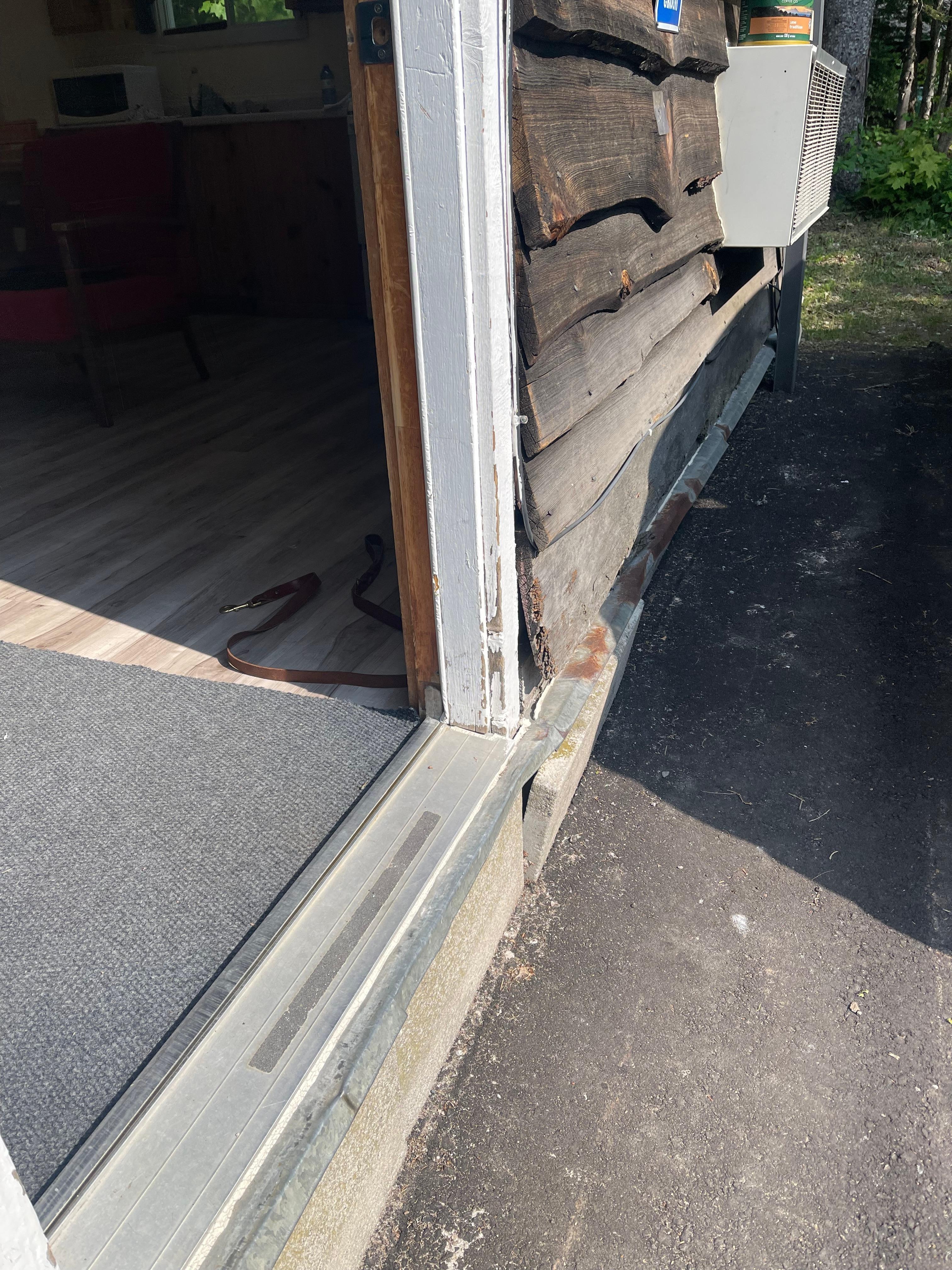 Sitting at the bottom of the door rotted