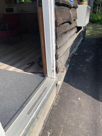 Sitting at the bottom of the door rotted
