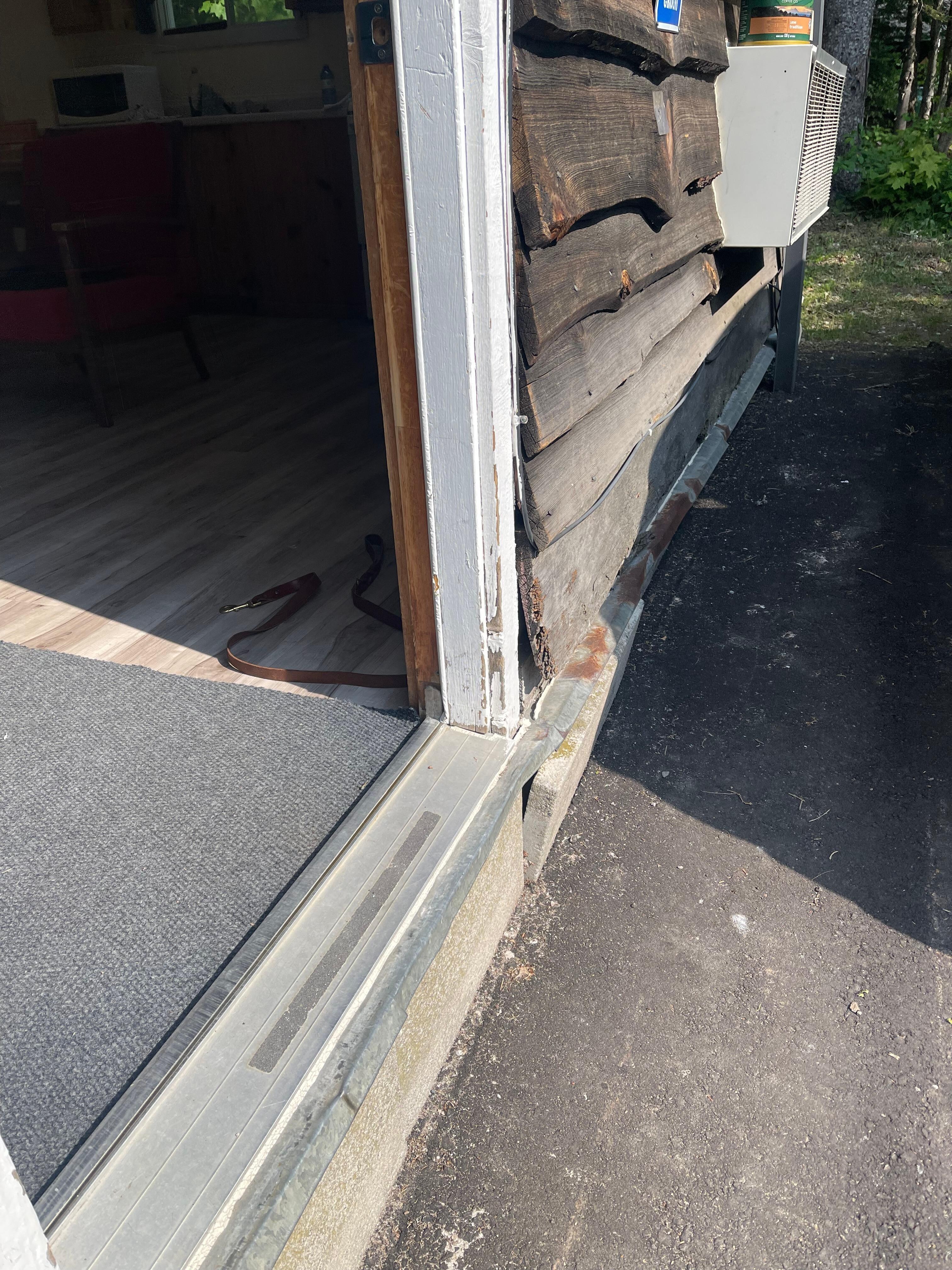 Sitting at the bottom of the door rotted