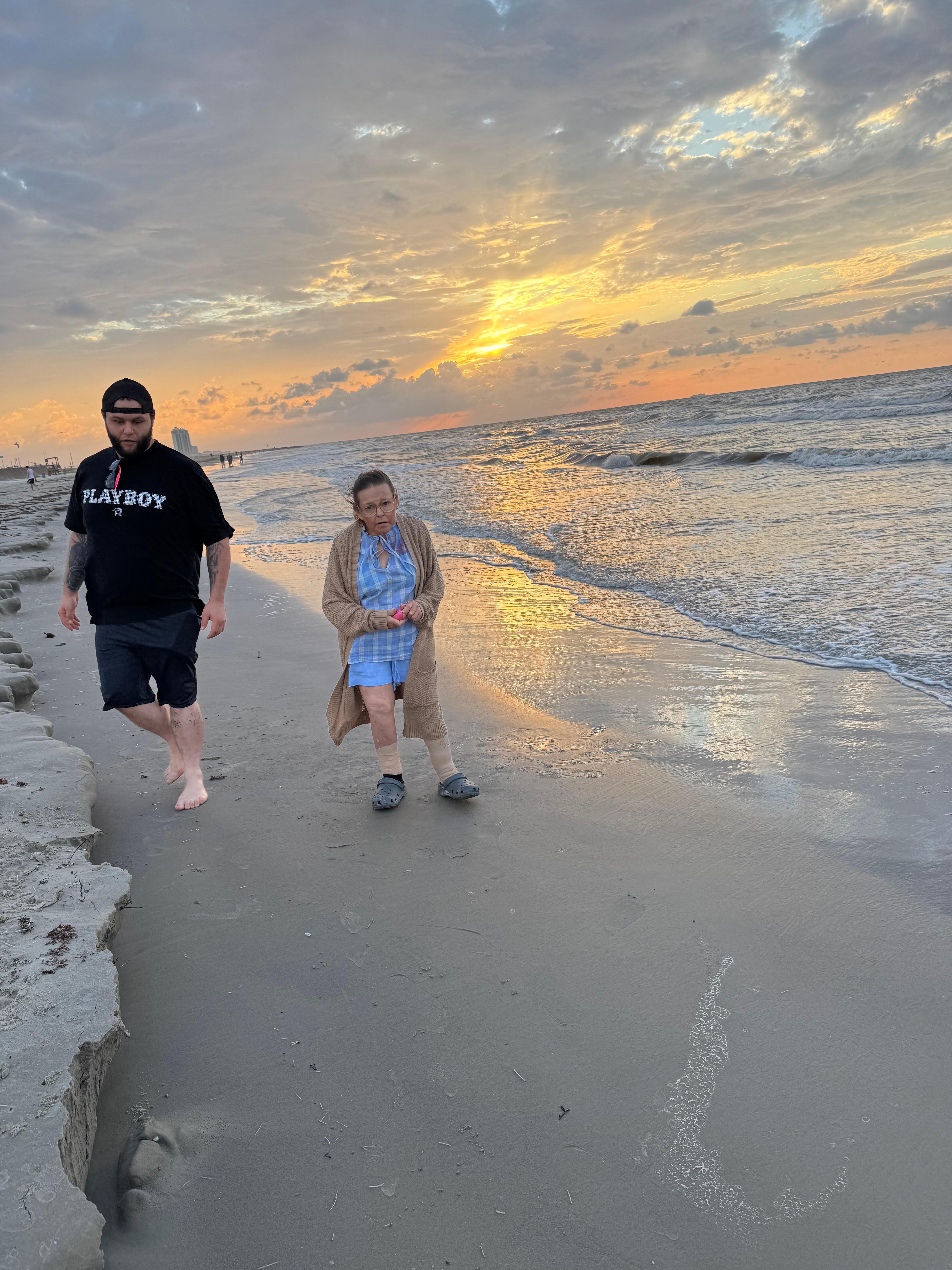 mom and brother on the beach 
