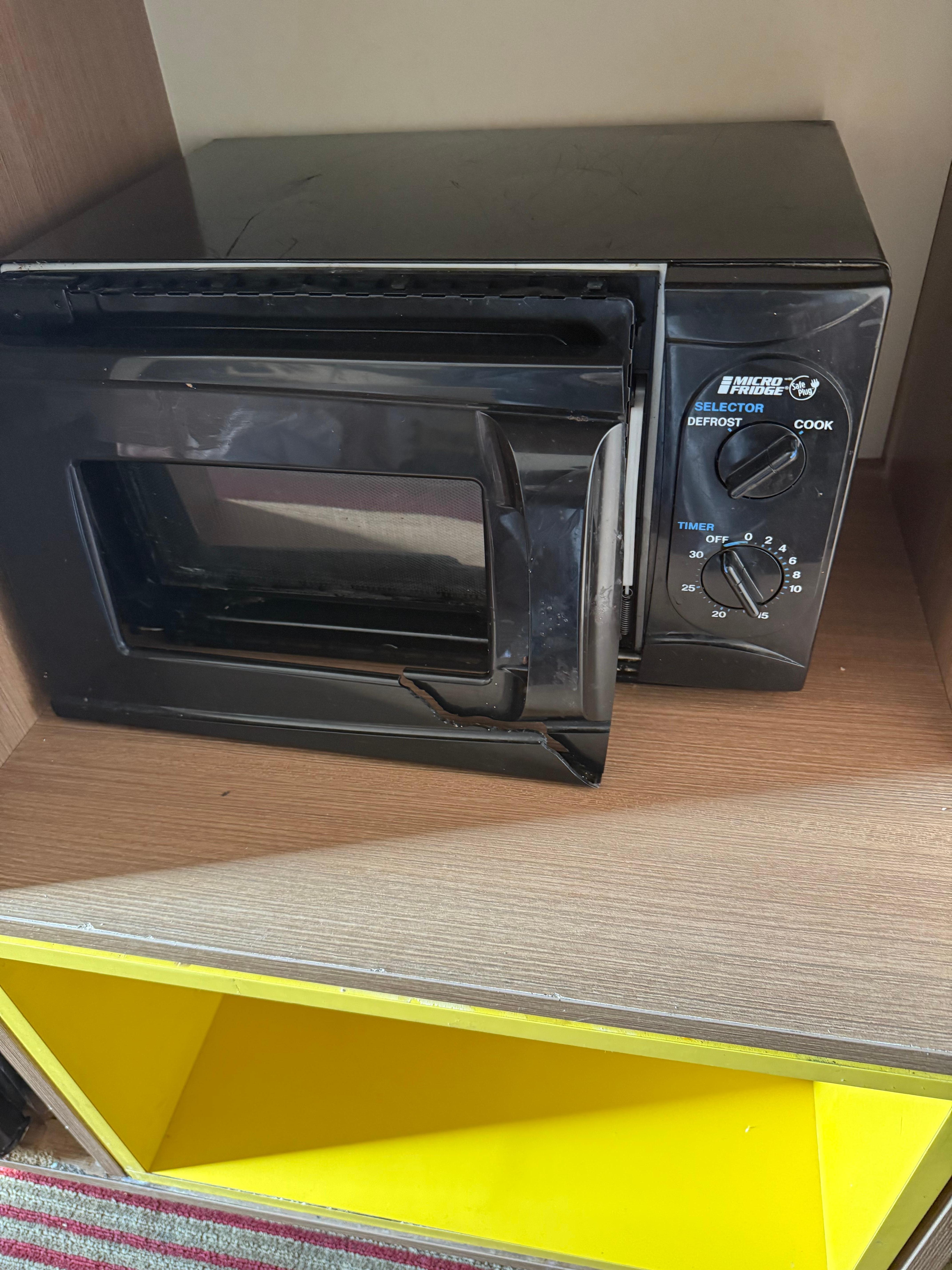 The whole microwave door cover came off. 