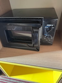 The whole microwave door cover came off.