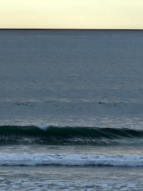How close the waves are all done outside the big living room window you have