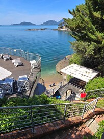 View of the private beach from one of the upper sun terraces