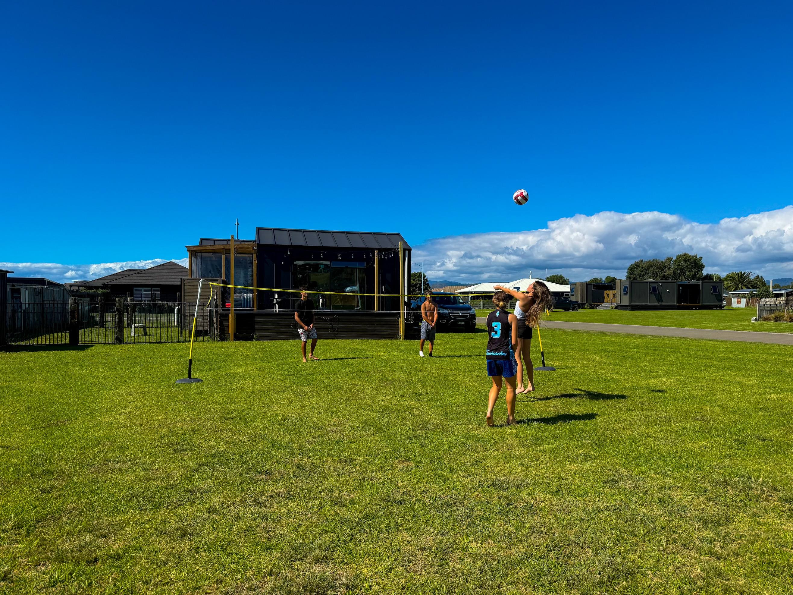 Teens burned energy with competitive sports antics! Volleyball, touch rugby, badminton… nice flat land in front of Bach 😁