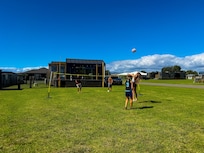 Teens burned energy with competitive sports antics! Volleyball, touch rugby, badminton… nice flat land in front of Bach 😁