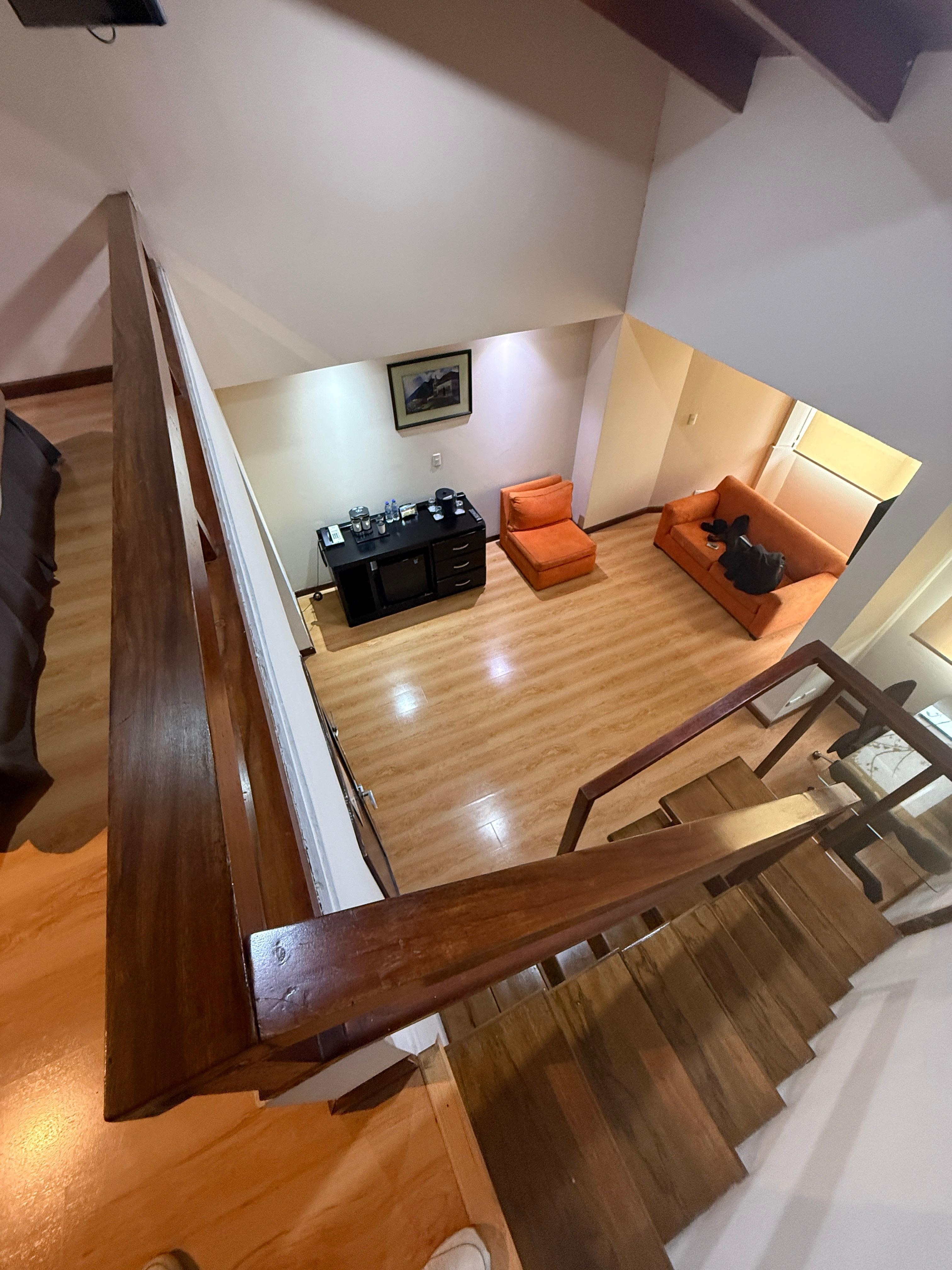 From the top looking down. Corner desk to work remotely and a 2nd tv. The black drawer had a mini fridge and coffee.