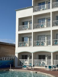 Outside view back of hotel and pool area