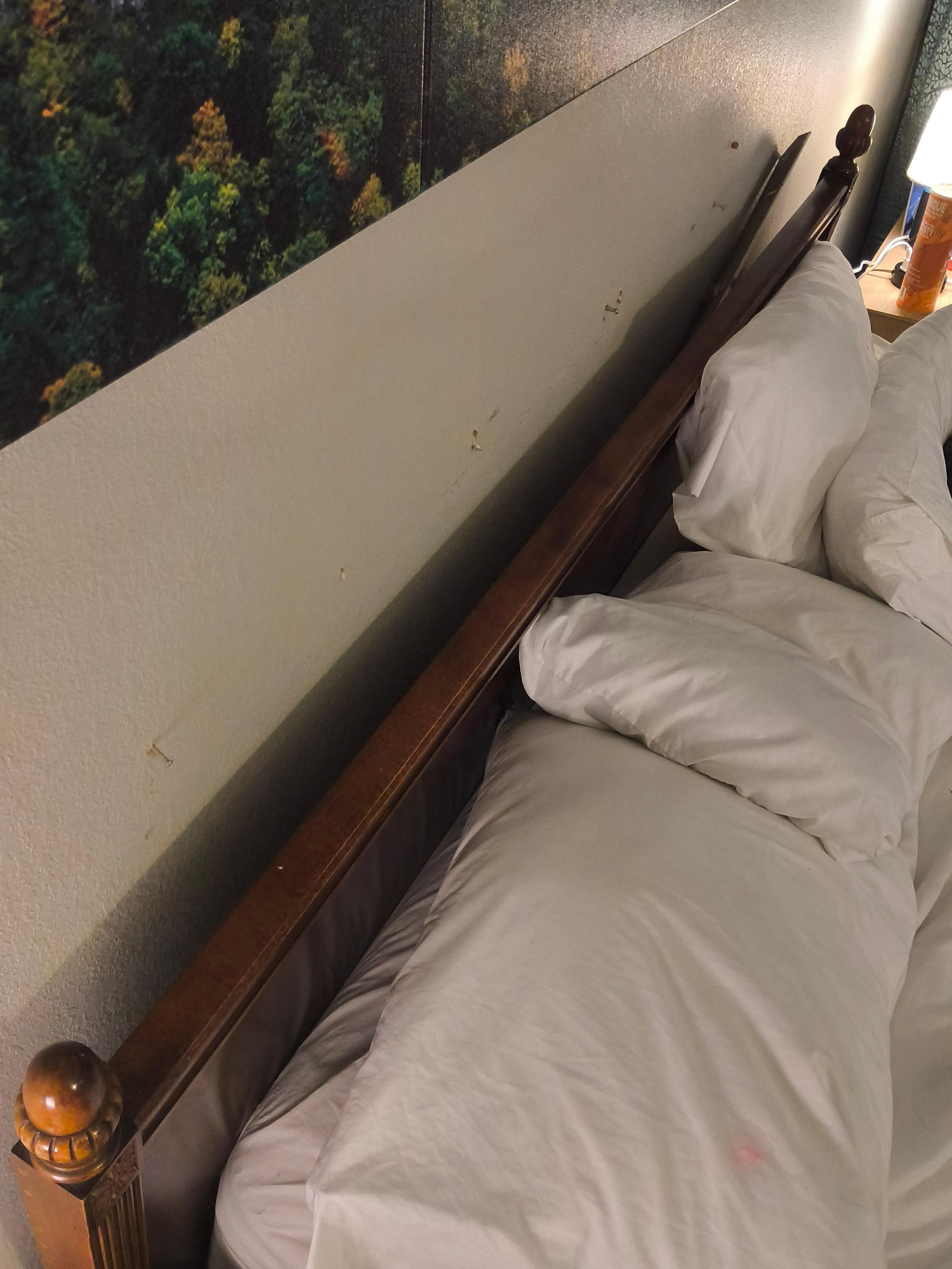 Headboard that fell off the wall while watching tv