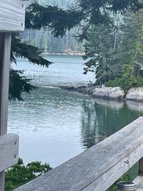 Boys fishing off rocks