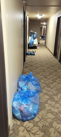 Trash in hallway all day, every day.