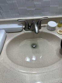 Clogged sink and had rocking toilet