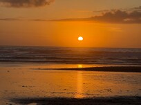 Sunset on the beach in front of our beach house