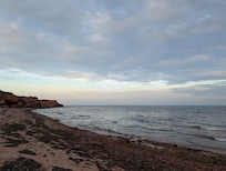 Beach behind the home.