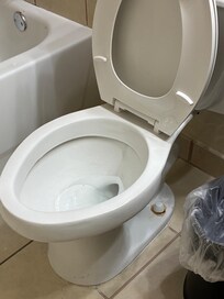 Rusted dirty toilet with black mold