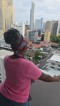 Checking out the view from my balcony room