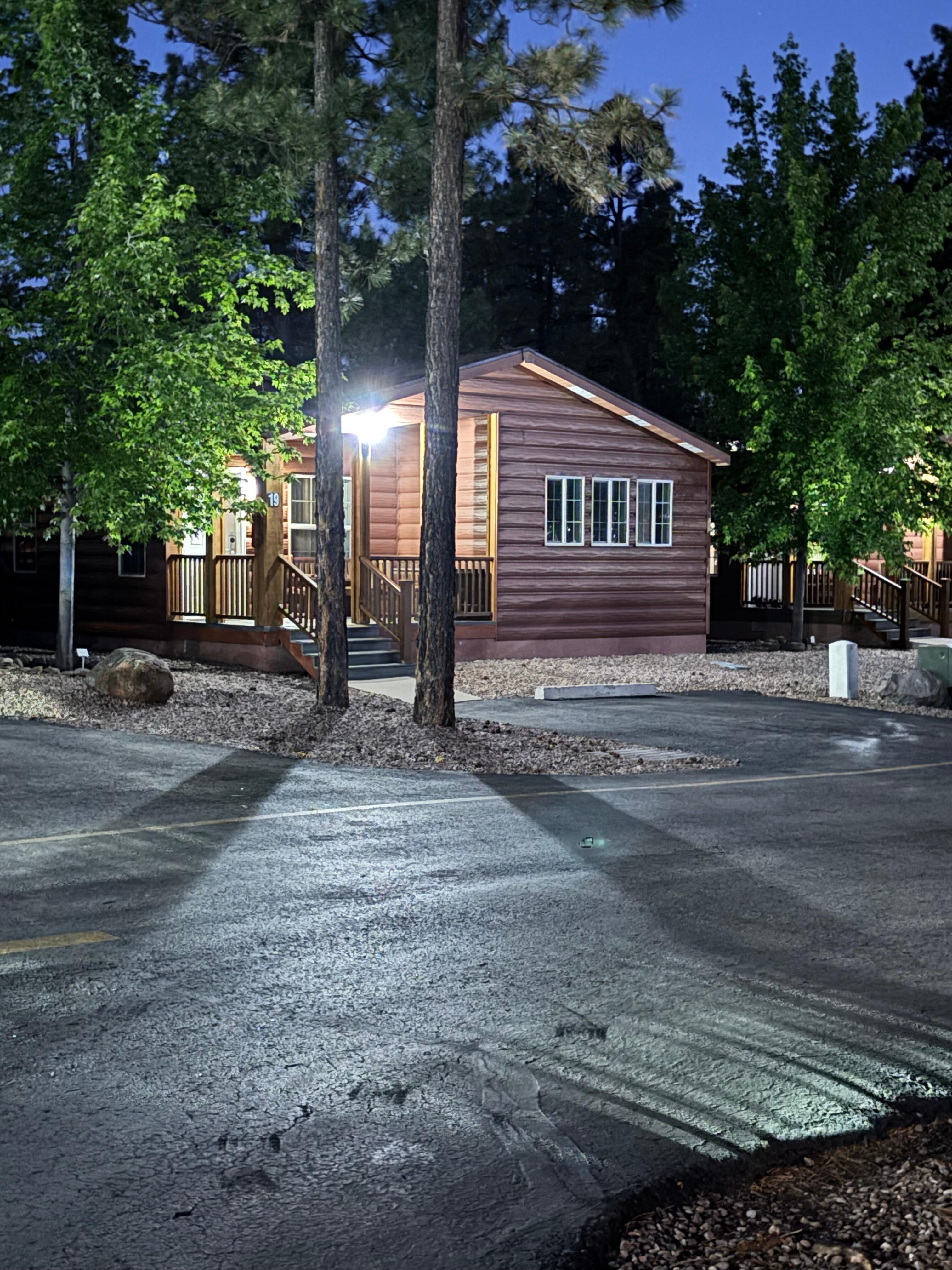 Night shot of our cabin in the pines. 