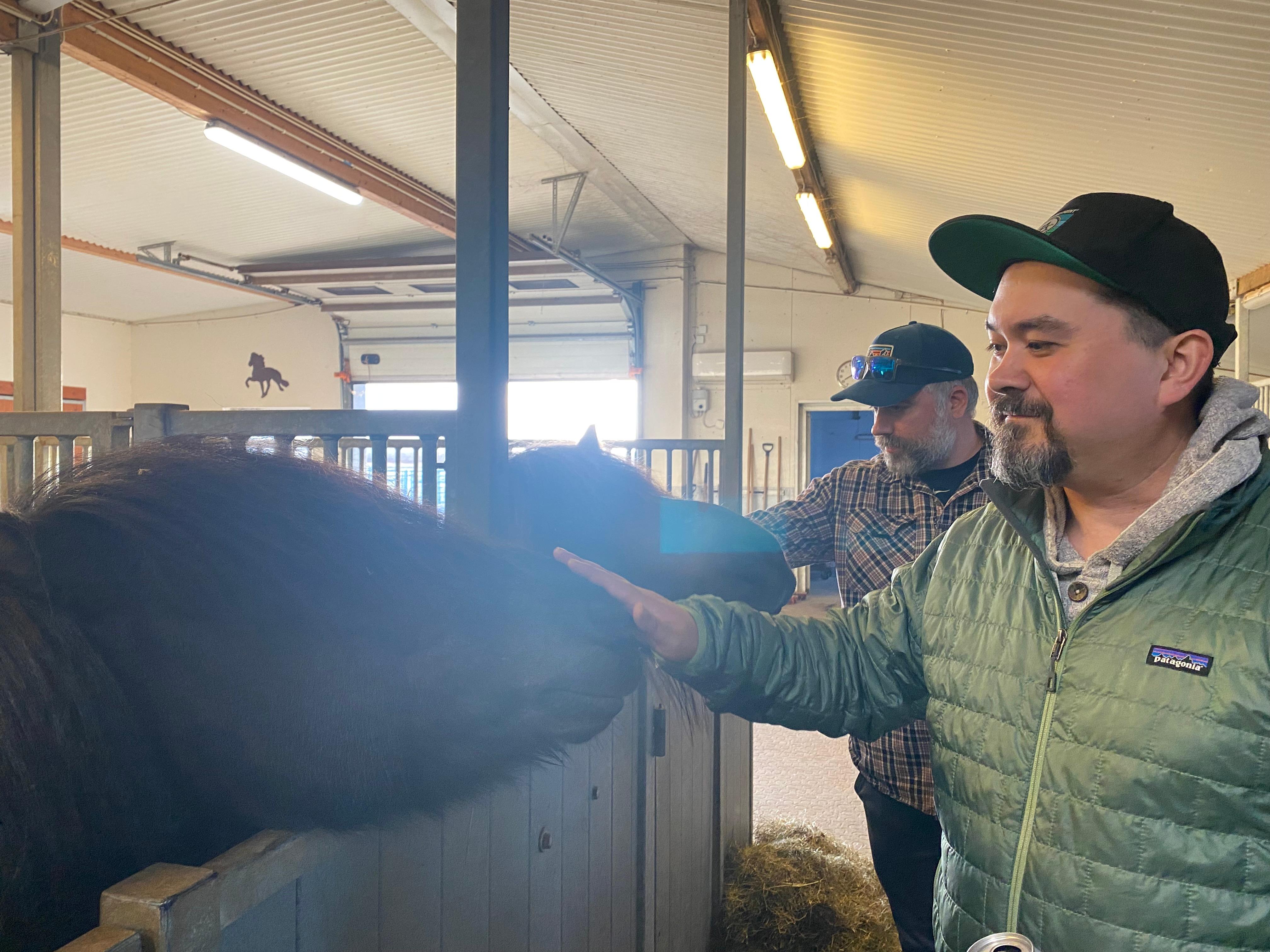Husband and friend getting some pets in
