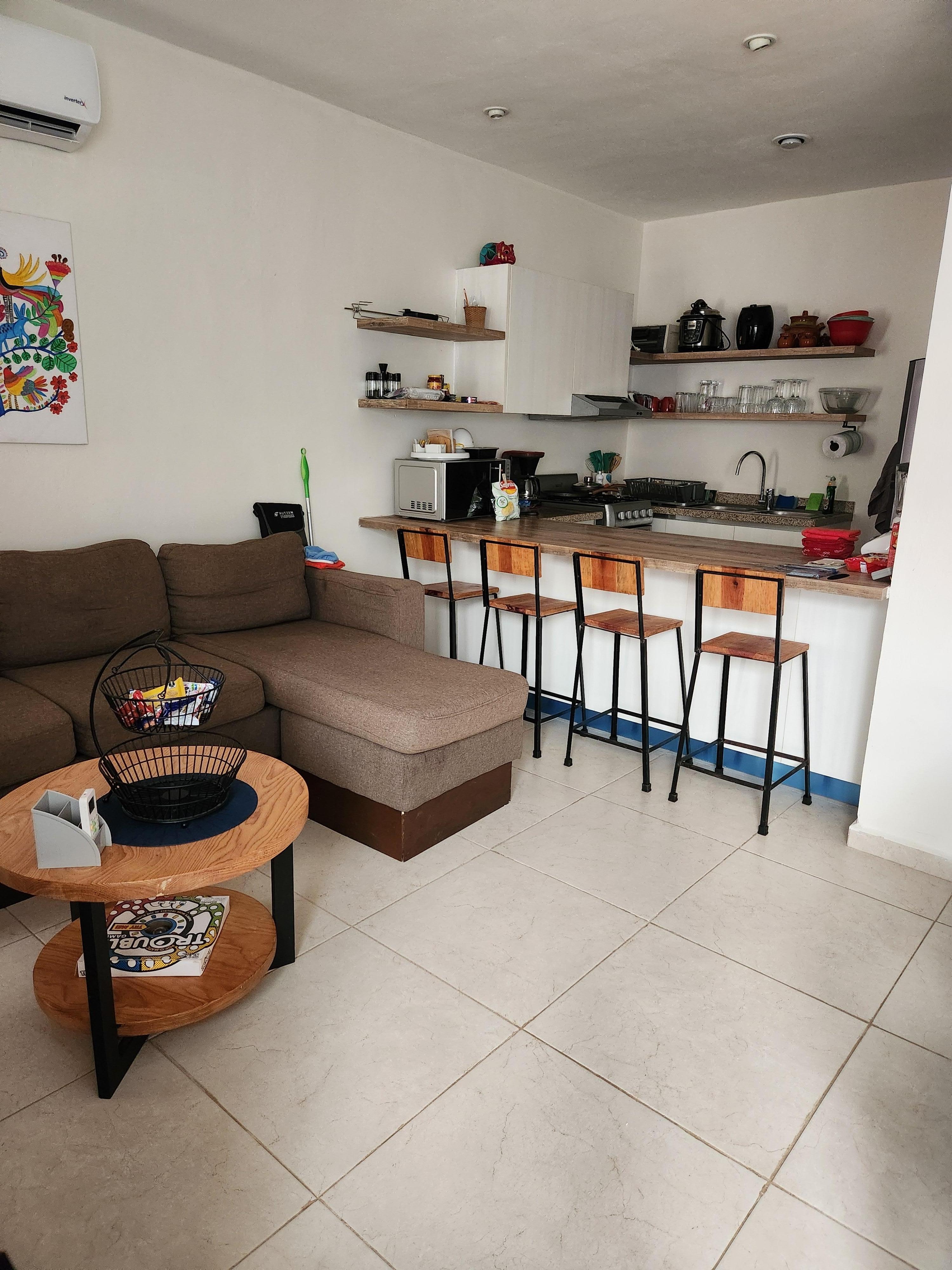 Living room, looking into kitchen 