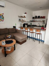 Living room, looking into kitchen