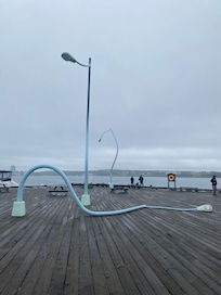 Drunken lamp posts art installation on the boardwalk in Halifax.