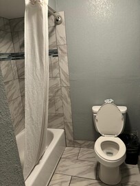 Bathroom. Not much space to place towels/change of clothes. Toilet is a bit wobbly.