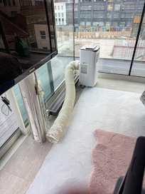 You have to open the sliding glass door in order to vent the portable air conditioning unit - defeats the purpose of the unit.