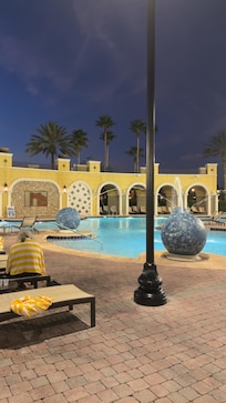 they have 2 pools and 3 hot tubs + a bar and entertainment!