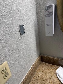 Shampoo dispenser was in sink, not tub/shower room