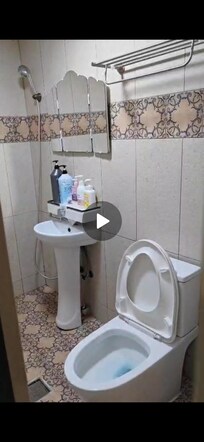 Bathroom comes with shampoo, body shower, facial wash, hand wash, towel rack, toothpaste etc