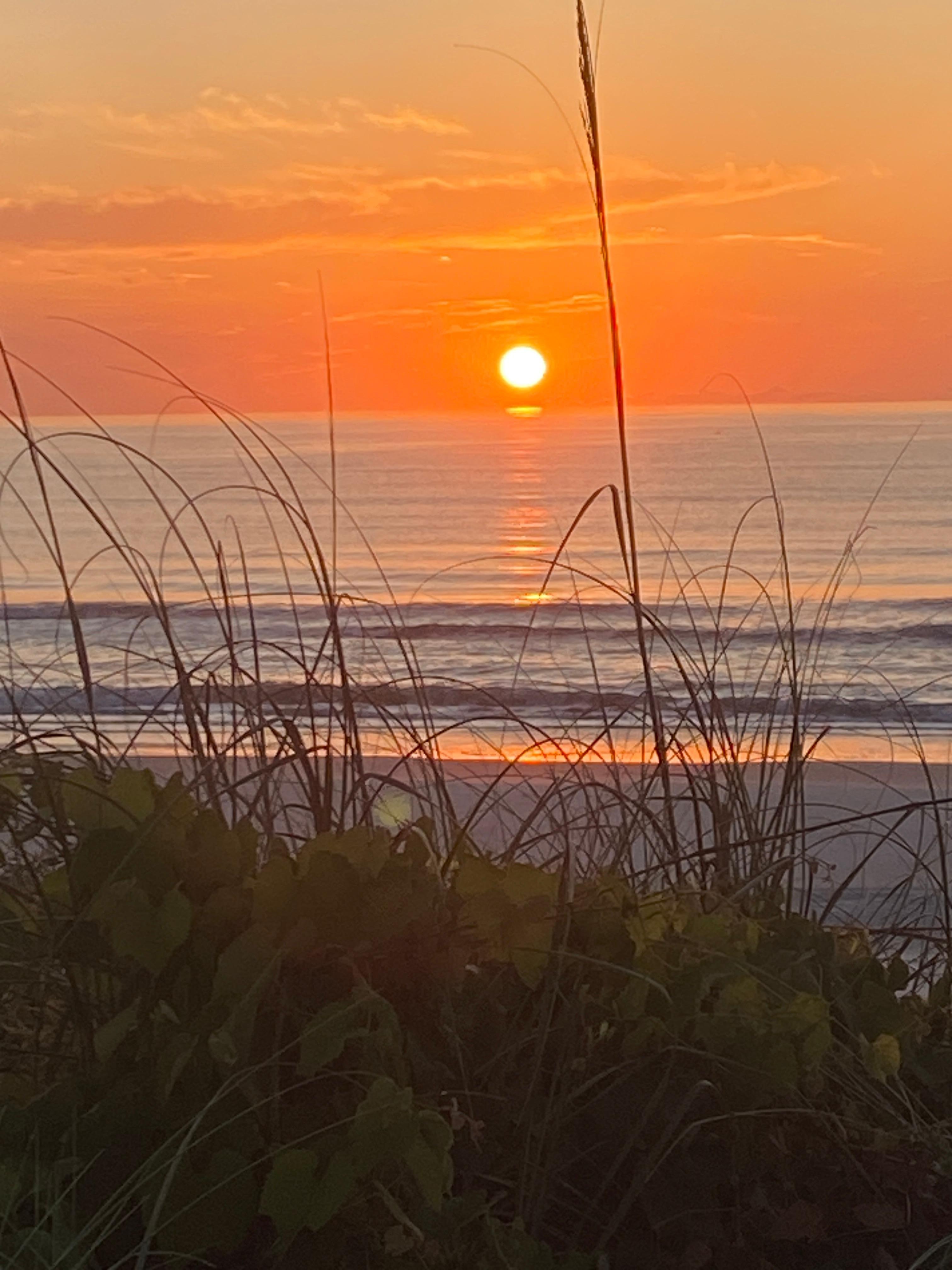 Sunrise from the walkway to the beach