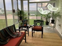Enclosed patio. Loved the butterfly lights!
