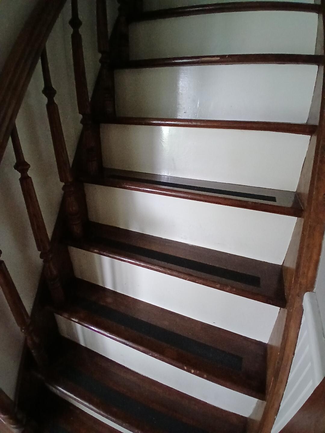Stairs to the upstairs in the Rock House. 