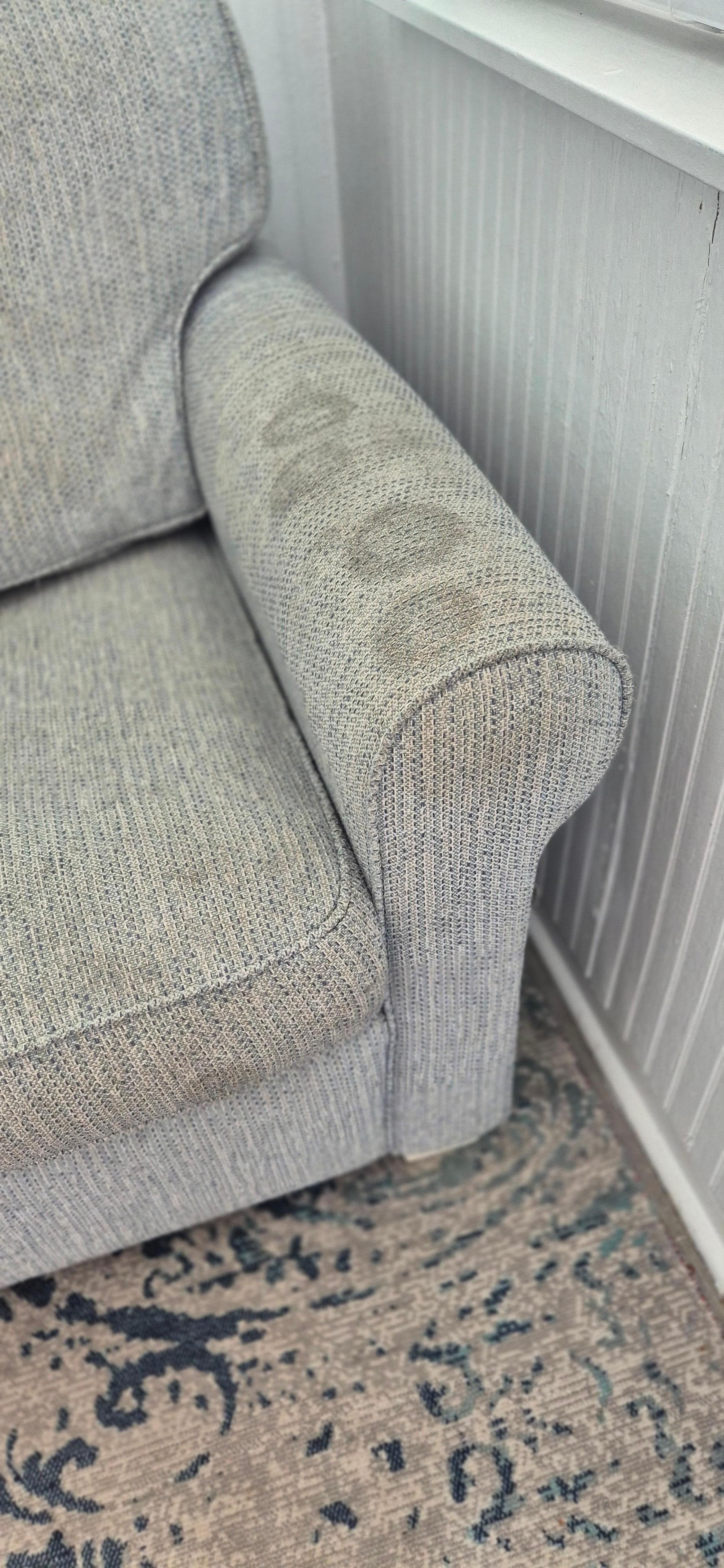 Dirty sofa.  Owner says will be replacing. 