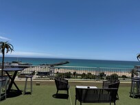 The rooftop terrace.