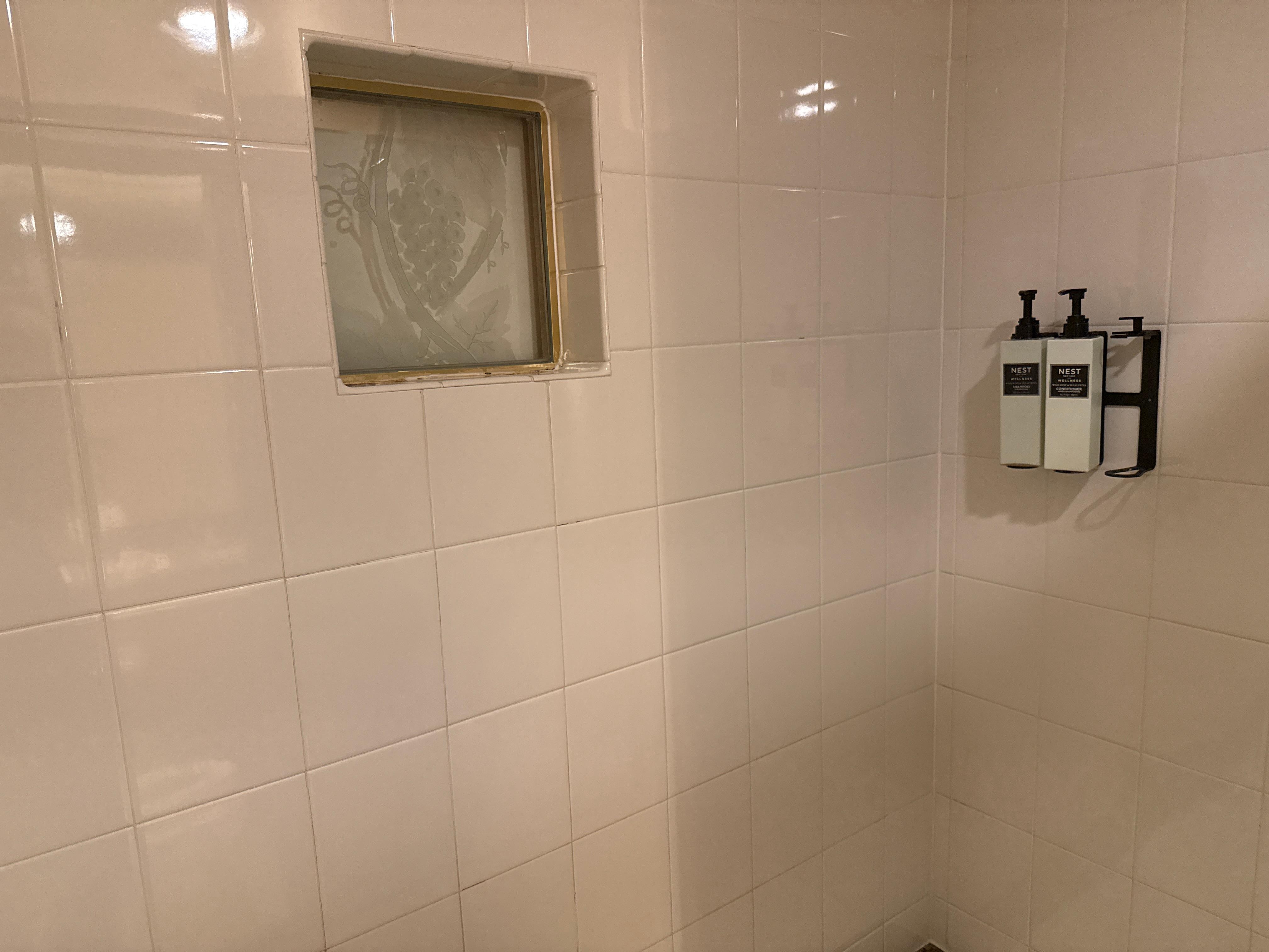 Shower, missing shower gel? Also dated. 