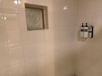 Shower, missing shower gel? Also dated.