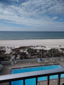 Deck view of beach with calming ocean waves. Loved our stay here and will be back.