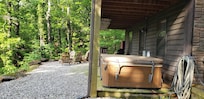 Nice area downstairs with hot tub and firepit