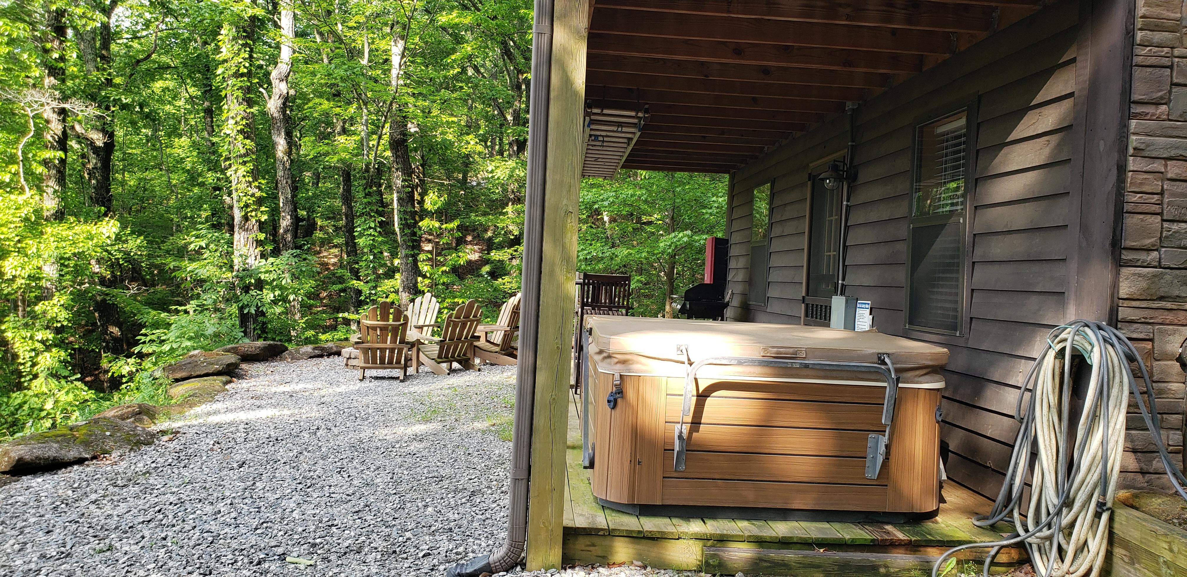 Nice area downstairs with hot tub and firepit