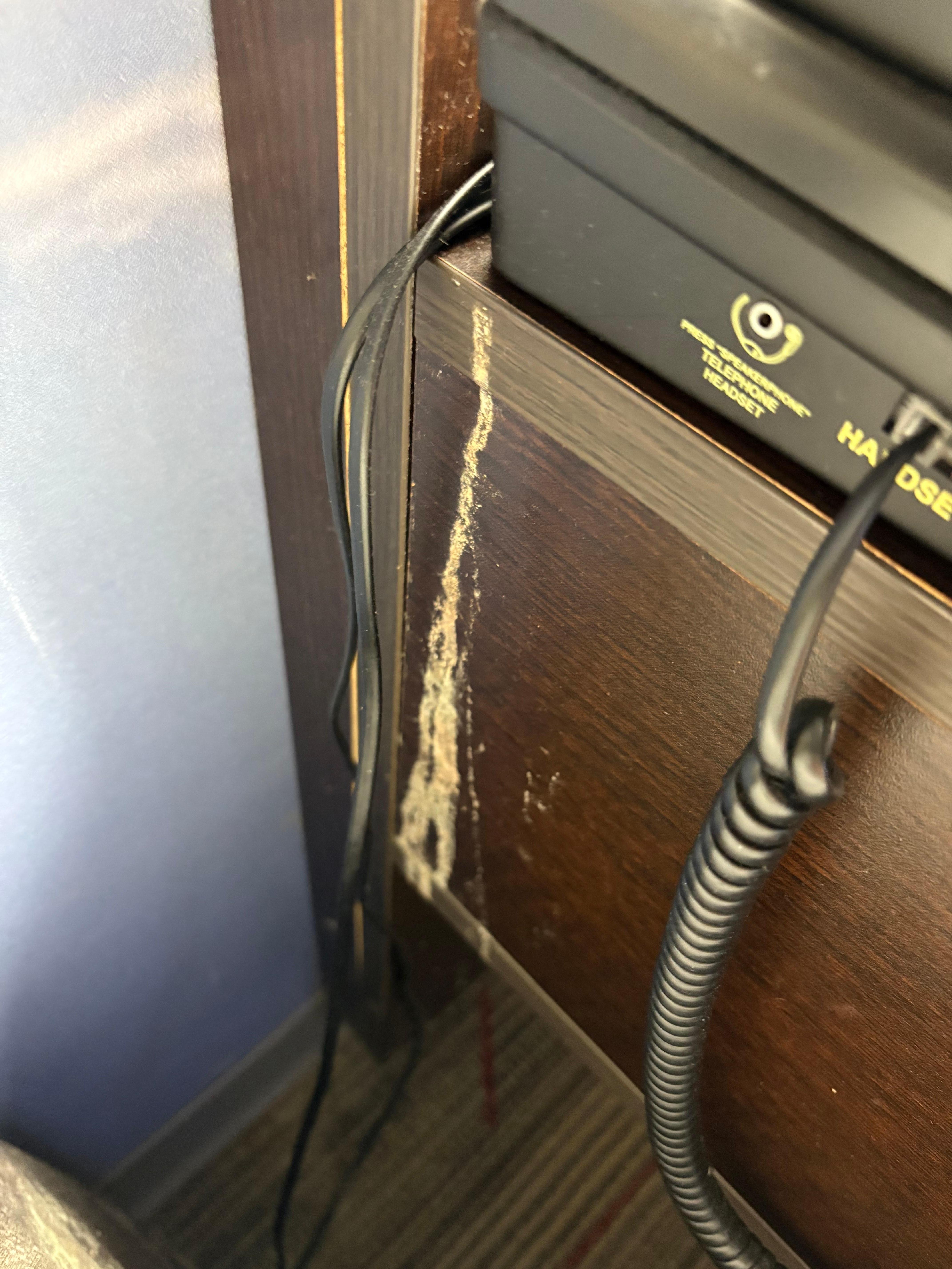 Dried vomit on the side table 